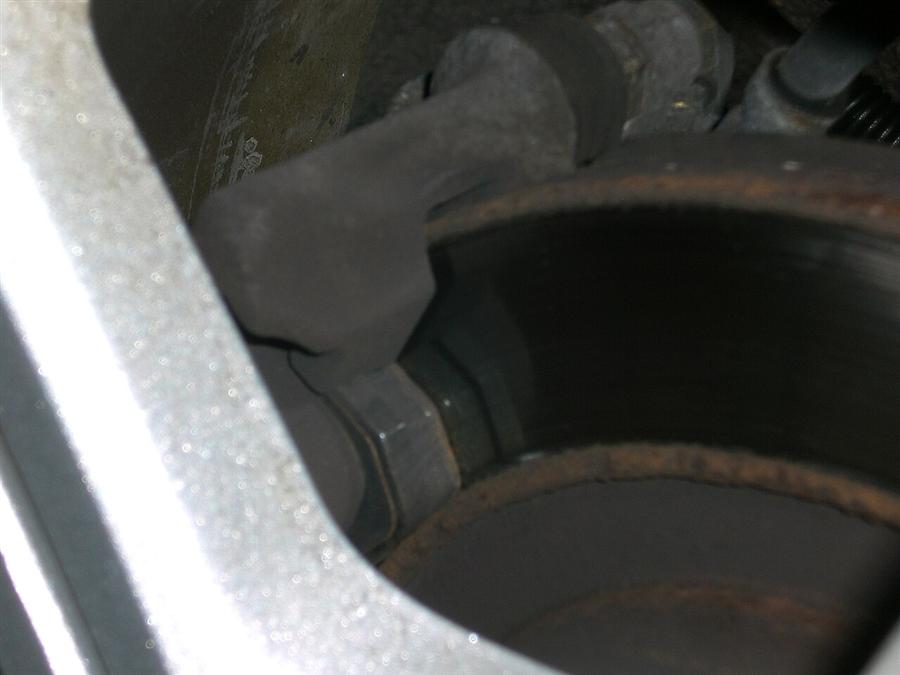 New performance brake pads on a workbench